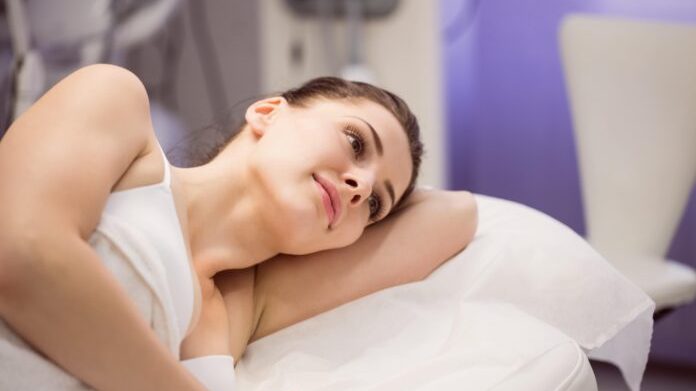 23 female patient lying bed min 696x420 1